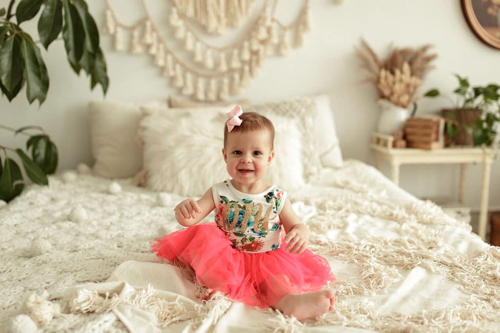 happy baby in boutique photography studio 