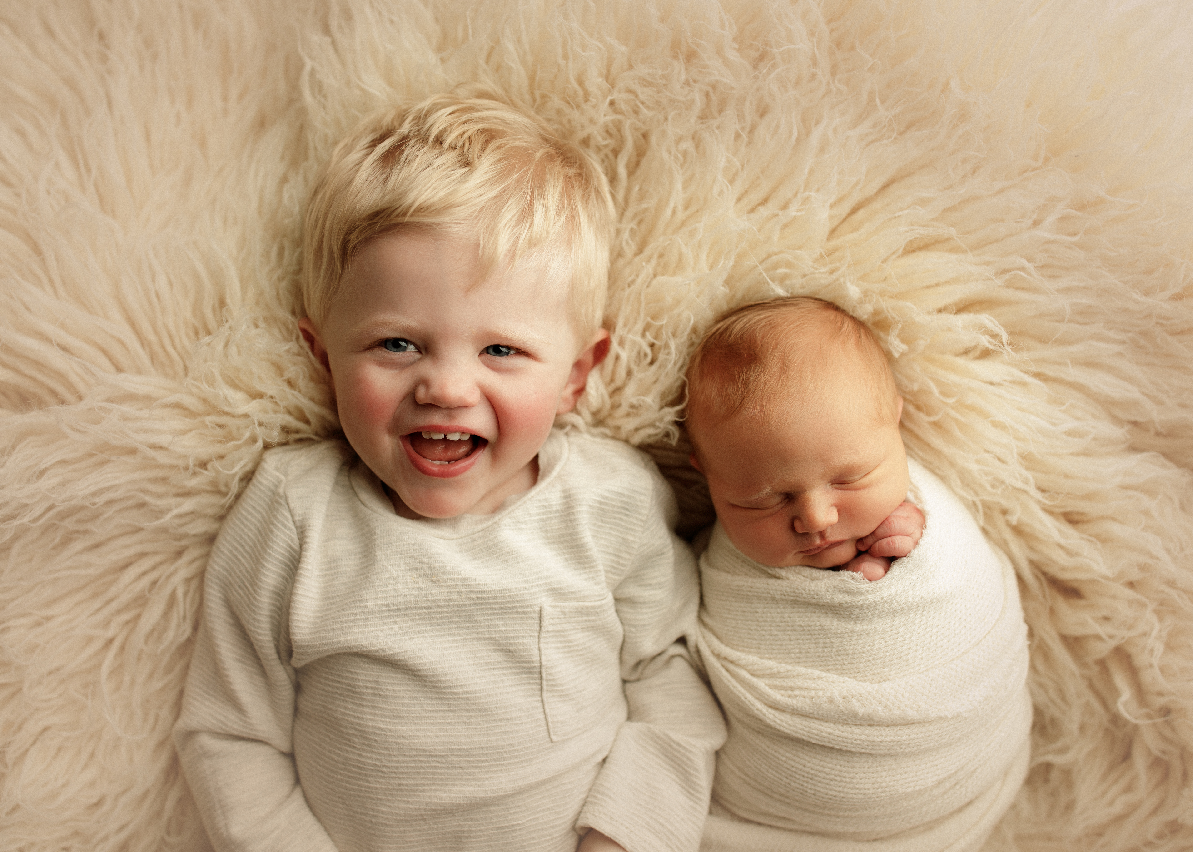 brothers at newborn photo shoot