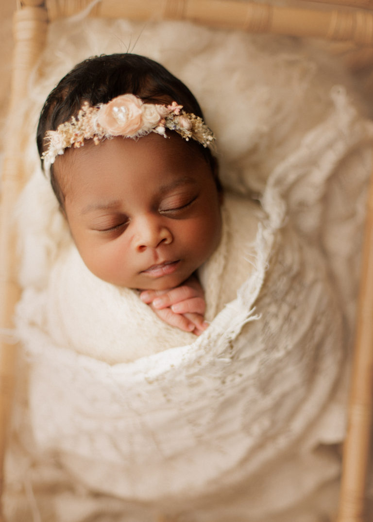sleepy baby at newborn photo shoot